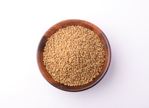 Indian Food Called Fenugreek Seeds or Sabut Methi Dana isolated on white background  