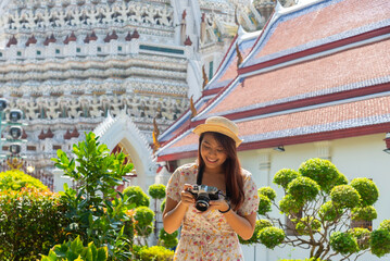 Traveler tourist enjoy walking to see the historic park of Thailand exciting to explore the...