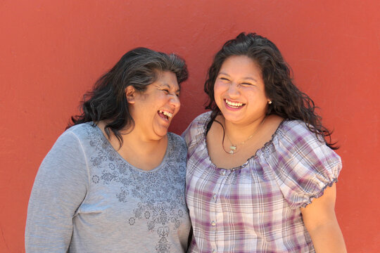 A 50-year-old divorced single mother and her 20-year-old Latina daughter show their love and spend time together to celebrate Mother's Day