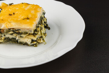 Delicious spinach and cheese layered dish on a plate