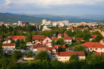 Fototapeta premium Aerial view of Nikšić, the second largest city in Montenegro - Residential area of an important industrial, cultural, and educational center in the Balkans