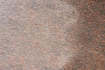 extured Close-Up of Red and Gray Granite Stone Material Surface Background
