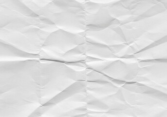 Fototapeta premium Observe the delicate yet pronounced texture of this crumpled white paper, an abstract composition in varying shades of a single color.