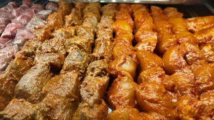Grilled meat skewers prepared for an outdoor barbecue event