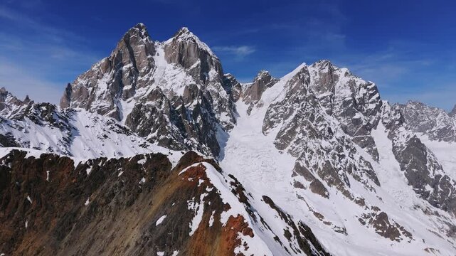 Koruldi Ridge Hike Overlooking Mount Ushba In The Caucasus Mountains In Georgia. Aerial Drone Shot