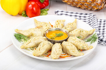 Steamed asian dumpling momo with meat