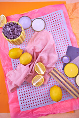 Color palette mood board in bright orange tones and purple decor for interior design and decor, top view