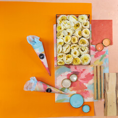 Color palette mood board in bright orange tones with blue decor for interior design and decor, top view