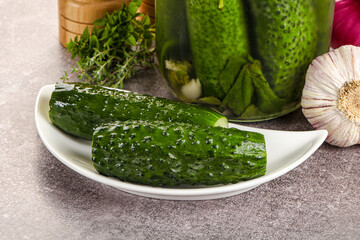 Homemade lighty salted cucumbers with herbs