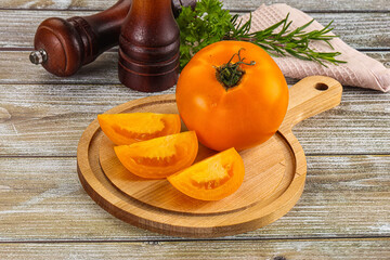 Organic juicy ripe yellow tomatoes