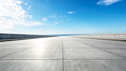 Vast Empty Road Leading to Ocean Under Blue Sky Stunning Landscape Photography