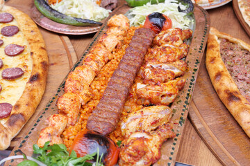 Grilled meat and vegetable platter with sides