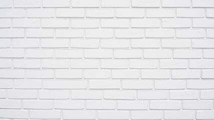Naklejka premium Sleek White Brick Wall with Sunlight Shadows