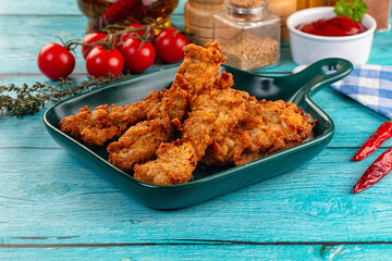 Golden crispy fried chicken strips