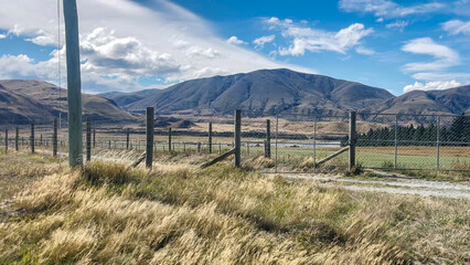 Surrounded by mountain ranges the extreme arid dry farming fields in the Rangitata Valley  in Canterbury NZ