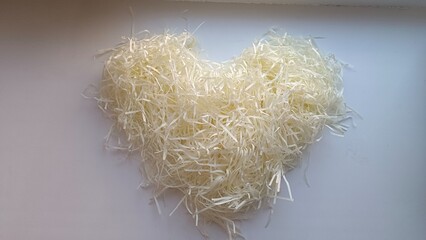 Vanilla beige paper filler heart on a light background