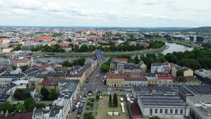 Obraz premium Panoramic aerial view of Krakow rooftops and forest