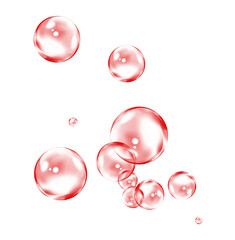 Cluster of red glossy bubbles in soft floating arrangement.