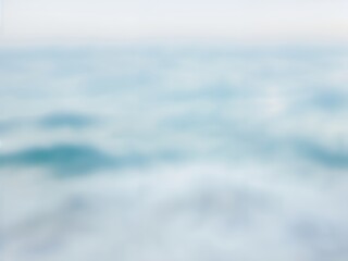 Abstract depiction of a soft blue ocean surface merging with a serene, bright sky, evoking a sense