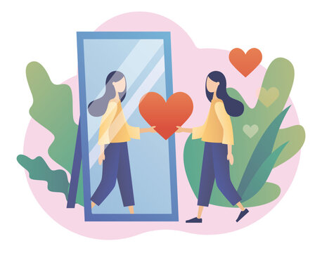 Mirror reflection of selflove woman passing a heart to her inner self