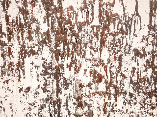 Weathered textured wall with peeling paint abstract pattern