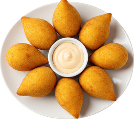Golden Coxinhas Circle with Creamy Dip on a White Plate Top View