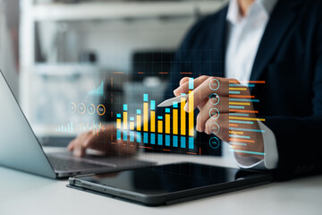 Business data analysis report with performance indicators dashboard, businessman using digital tablet and laptop to analyze data, economic growth chart graph, market research and strategic planning.