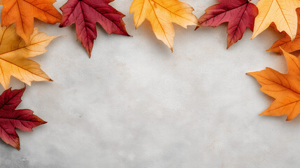 Autumn leaves arranged on a stone background for Thanksgiving  
