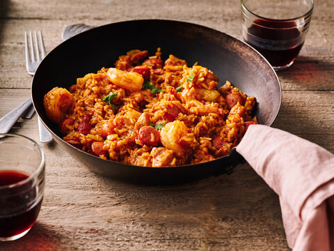 Delicious sausage, shrimp, and rice blend together in a single pot, creating a warm and inviting dish. The vibrant colors and rich flavors make it ideal for family gatherings or casual meals