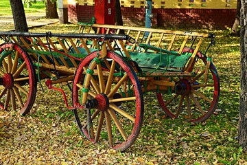 Antique wooden cart as a design element in the park