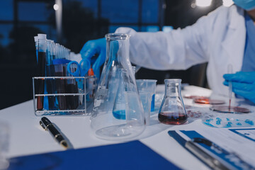 Researcher using a professional microscope