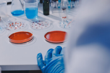 Researcher using a professional microscope