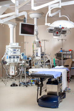Interior of an operating room with table and equipment