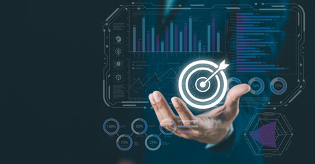 A hand appears to interact with a digital dashboard displaying graphs and data analytics, emphasizing data-driven decision-making.