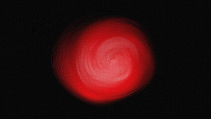Abstract red light glowing softly in the darkness creating a blurred and indistinct shape in the night