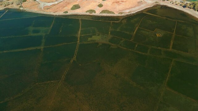 Aerial of submerged foundations of the ancient city of Olous near Elounda, Crete