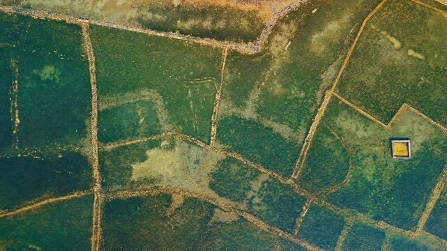 Aerial overhead view of the submerged ancient Dorian city ruins of Olous, Elounda