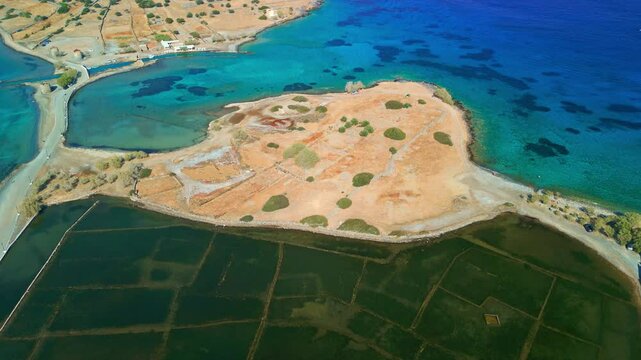 Aerial view of ancient Olous ruins submerged in the sea near Elounda, Crete.