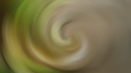 A blurred abstract image featuring a soft swirl of white and green colors in a gentle composition