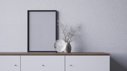 A minimalist interior scene featuring a blank frame, a decorative vase with dried flowers, and a stylish surface, 3d rendering blank frame grey wall for copy space advertising.