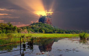 Majestic Majestic Sigiriya Rock  Fortress in Sri Lanka with Scenic golden sunlight Landscape view background.k  Fortress in Sri Lanka with Scenic golden sunlight Landscape view background.