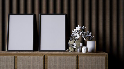 A modern interior scene featuring a wooden console with empty frames and decorative flowers against a textured wall.