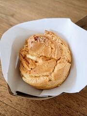 Choux wrapped on a paper 
