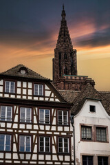 Medieval buildings and steeple of Strasbourg cathedral in Alsace, France
