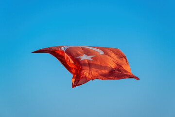 Turkish Flag Waving in the Clear Blue Sky
