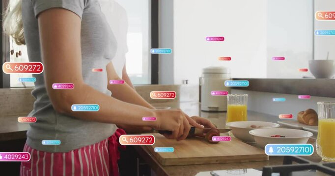 woman slicing fruit on wooden cutting board in kitchen, showing food tech data labels and icons