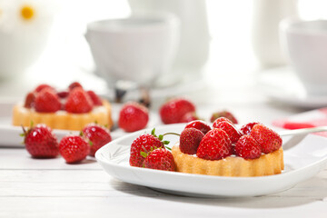Strawberry shortcake on coffee table, shallow depth of field