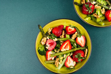 Diet salad with strawberries.