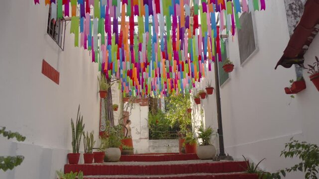 Peaceful Walk in a Festive Street of Mexican Magic Town mother mom and baby at Tapijulapa Tabasco Mexico
