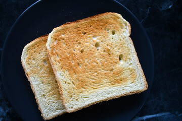 Toast bread on a plate. Flat lay top view photo. Food frrom above.